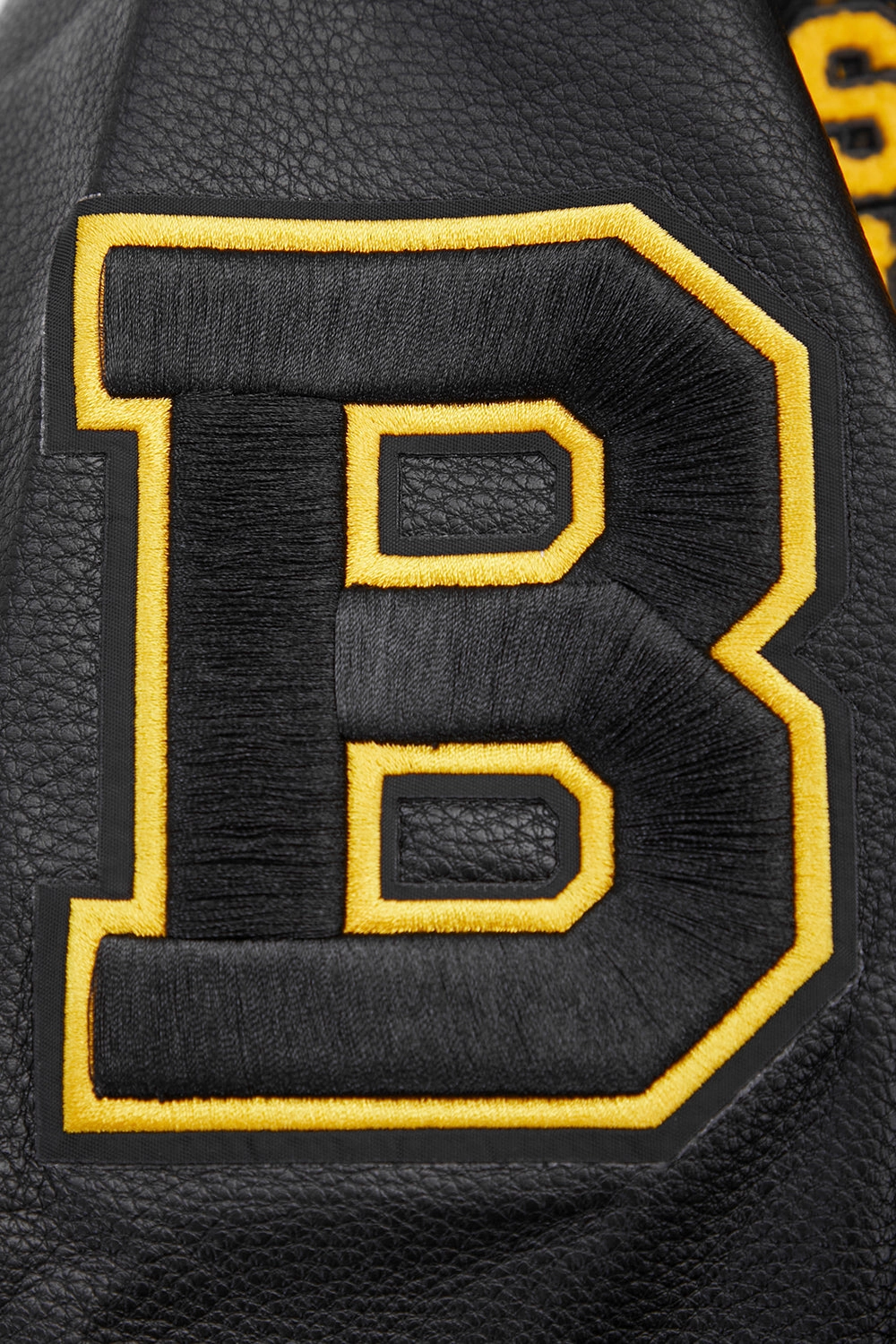 CHAMARRA UNIVERSITARIA NHL BOSTON BRUINS RETRO CLASSICS PARA MUJER