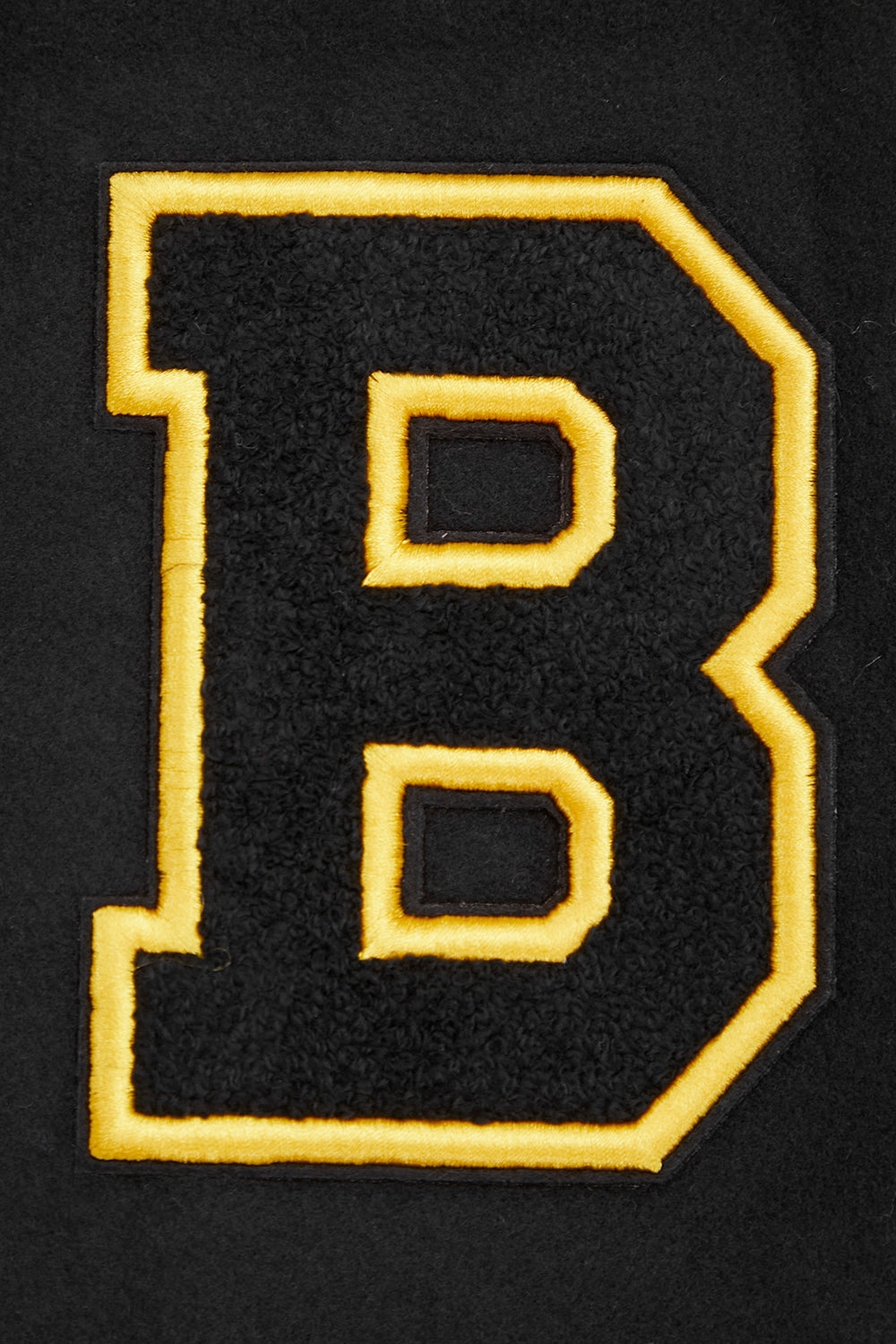 CHAMARRA UNIVERSITARIA NHL BOSTON BRUINS RETRO CLASSICS PARA MUJER