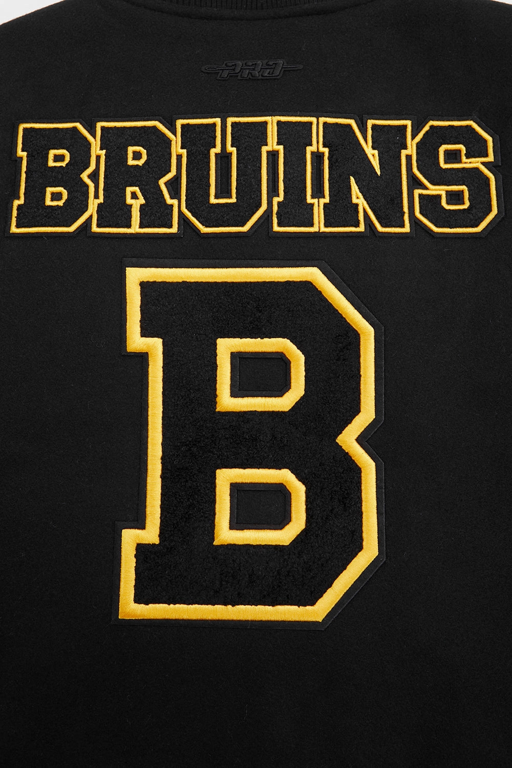 CHAMARRA UNIVERSITARIA NHL BOSTON BRUINS RETRO CLASSICS PARA MUJER