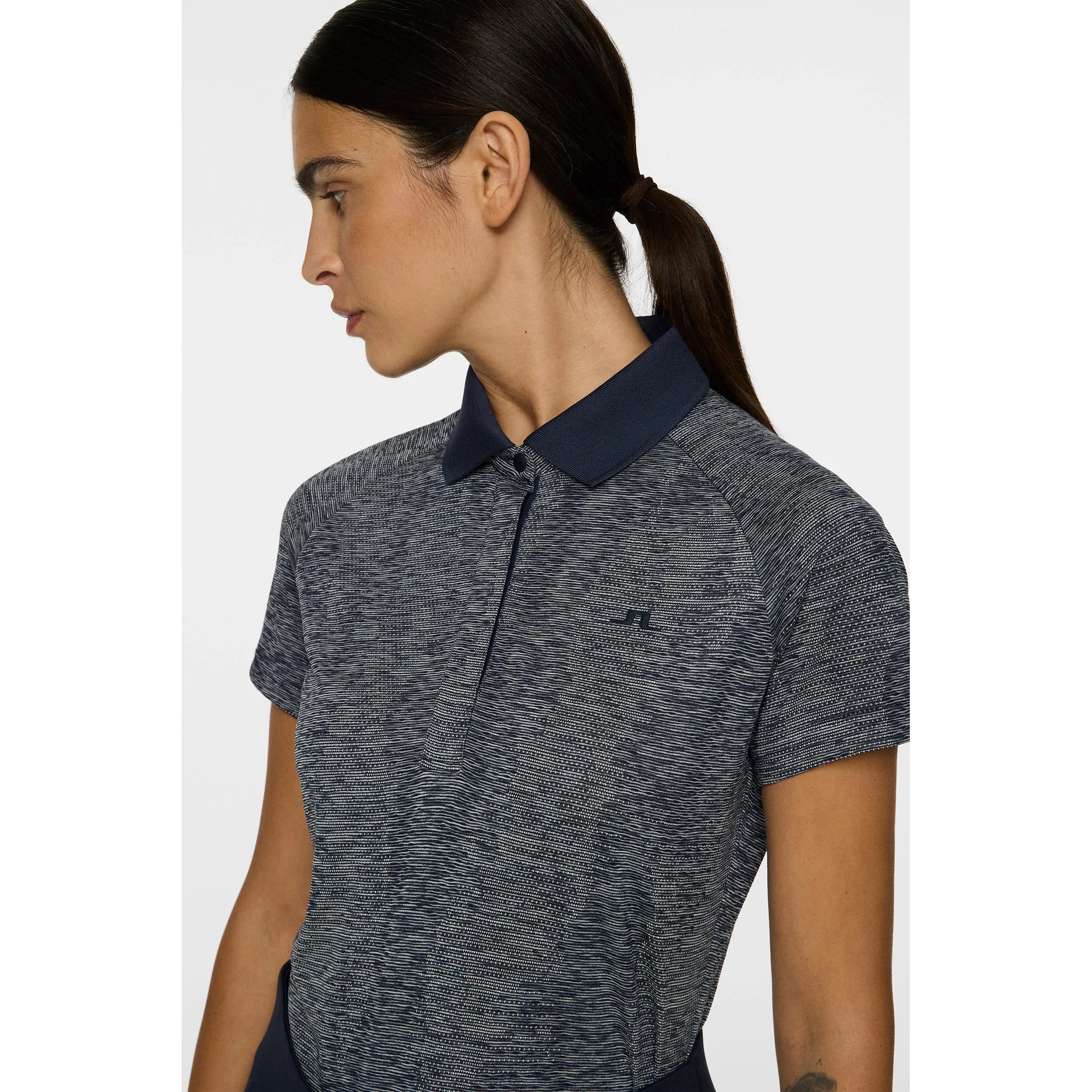 J.Lindeberg Women'S Minnie Golf Polo Shirt - Navy Melange Chase What Moves You Walk with Power